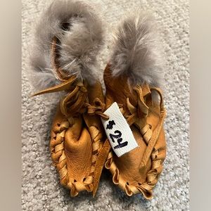 NWT Moccasin infant booties purchased in Alaska